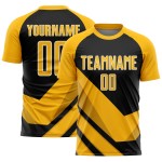 Uniforme de fútbol de sublimación con formas de flecha, camiseta dorada personalizada, negro y blanco Uniforme de fútbol de sublimación con formas de flecha, camiseta dorada personalizada, negro y blanco