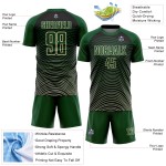 Camiseta de fútbol personalizada con degradado verde, color crema y negro, con diseño geométrico y sublimación de líneas Camiseta de fútbol personalizada con degradado verde, color crema y negro, con diseño geométrico y sublimación de líneas