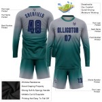 Camiseta larga de fútbol azul marino-verde azulado con mangas desteñidas grises personalizadas por sublimación Camiseta larga de fútbol azul marino-verde azulado con mangas desteñidas grises personalizadas por sublimación